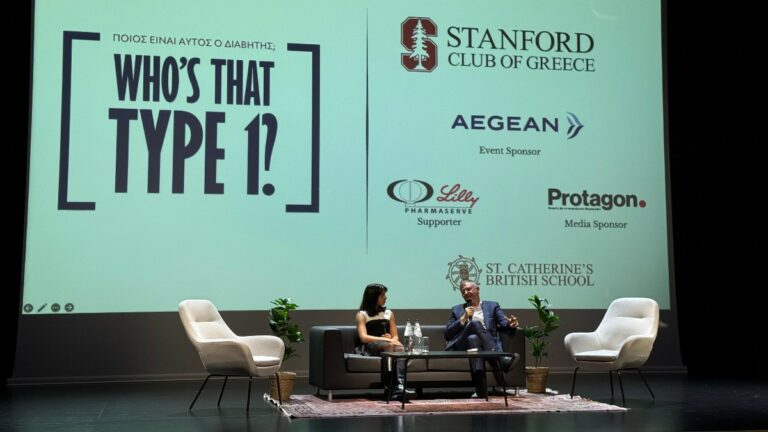 Fireside chat on stage in front of the Who’s That Type 1? event screen